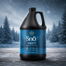 Snö Drift black bottle in a snowy winter product scene