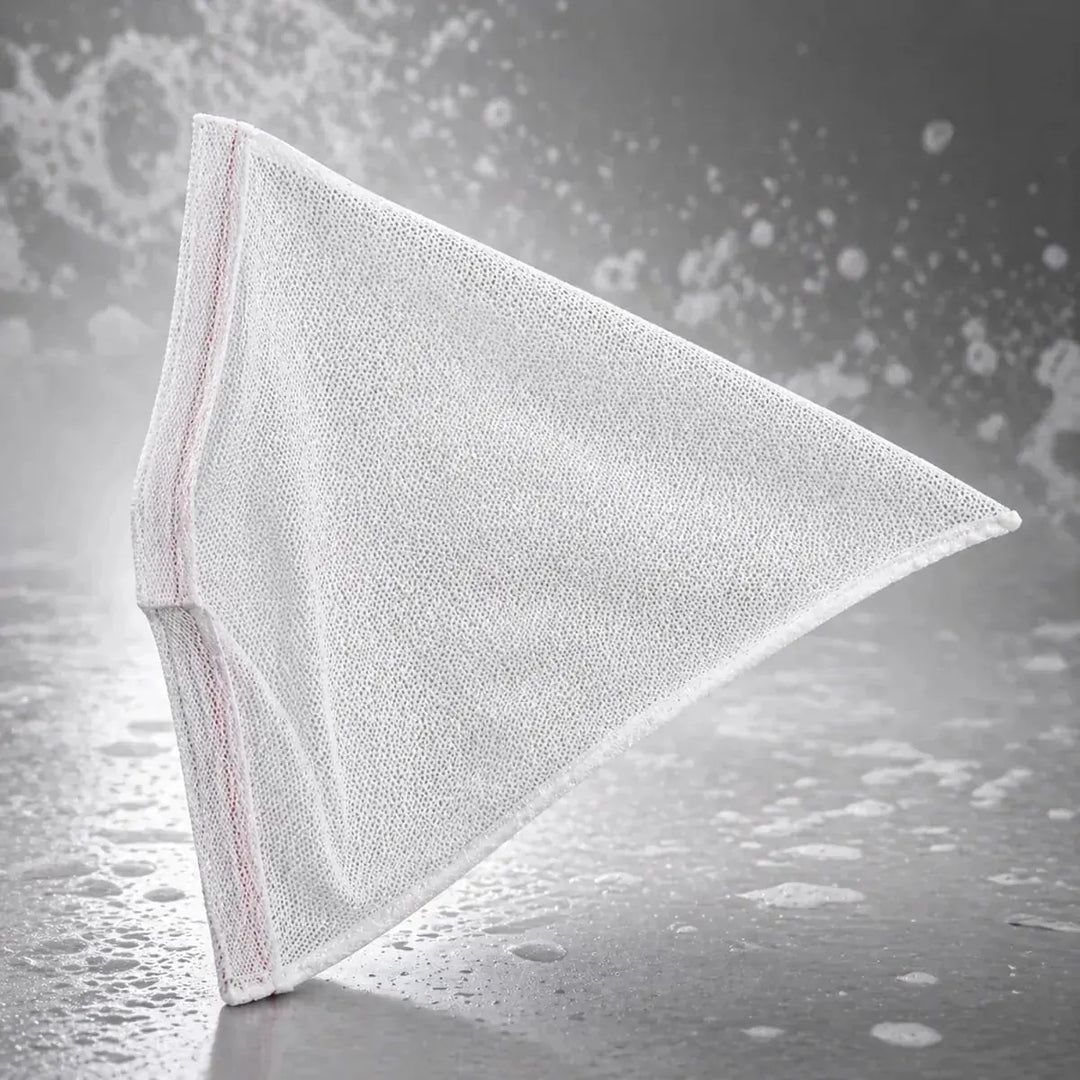 White triangular cloth on a textured gray background