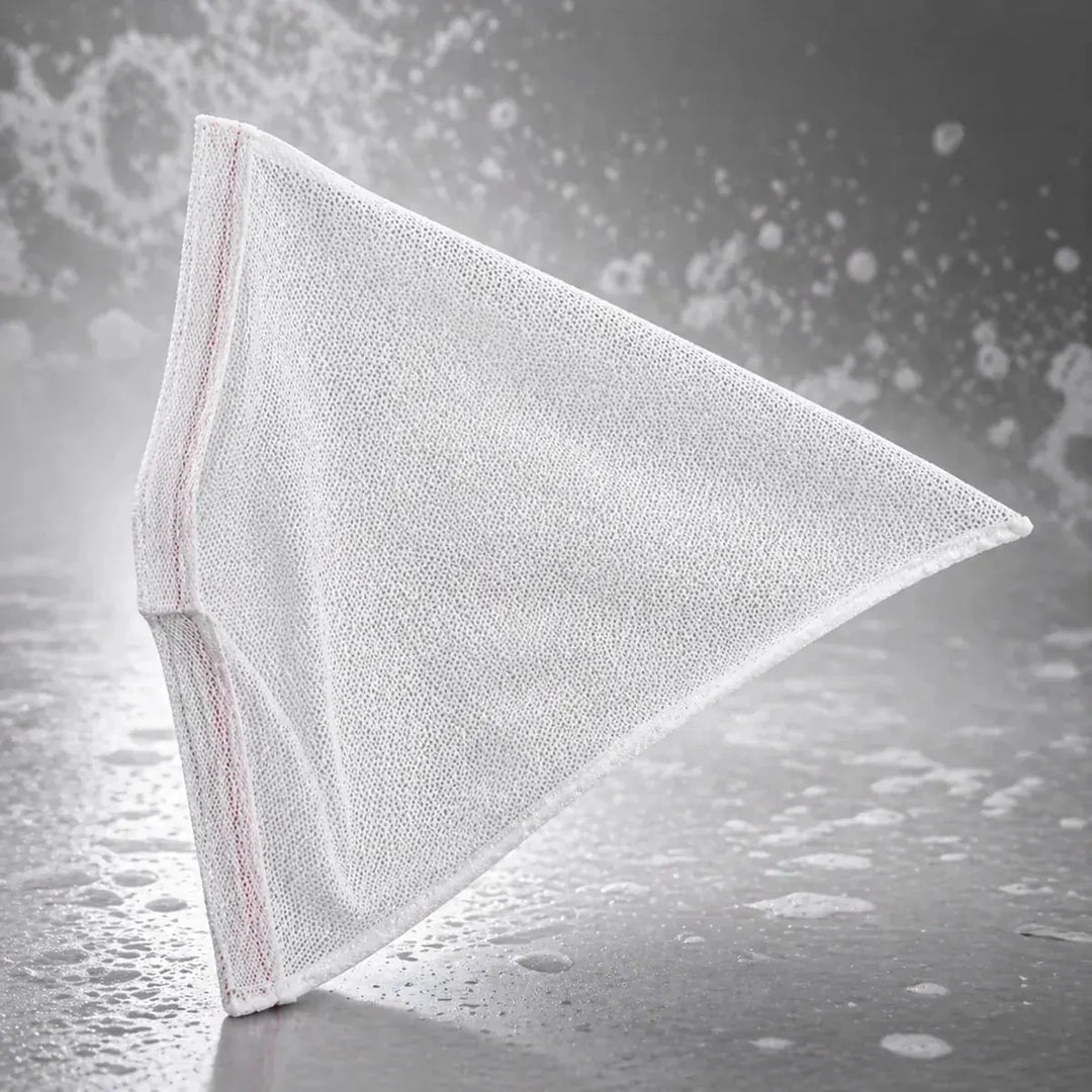 White triangular cloth on a textured gray background