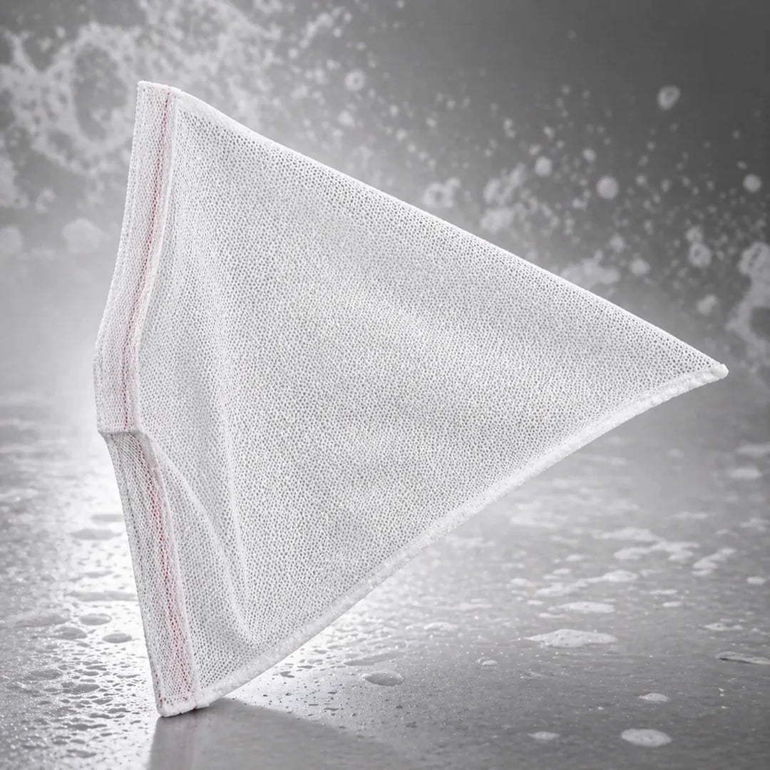 White triangular cloth on a textured gray background